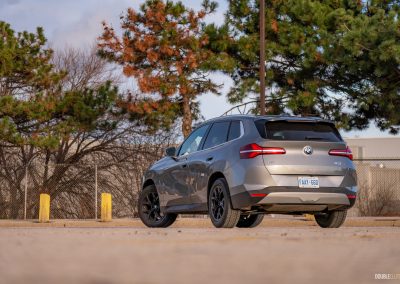 Rear three quarter view of the 2025 BMW X3 30