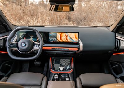 2025 BMW X3 30 interior wide view of dashboard and ultrawide display