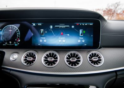 2025 Mercedes-AMG GT 63 S E-Performance 4-Door Coupe interior view of carbon fibre dashboard and center screen