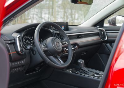 Interior view of the cockpit in a 2025 Mazda CX-50 Hybrid