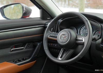 Interior view of the cockpit in a 2025 Mazda CX-50 Hybrid