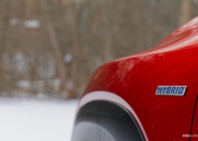 Close-up of the front fender badge on the 2025 Mazda CX-50 Hybrid
