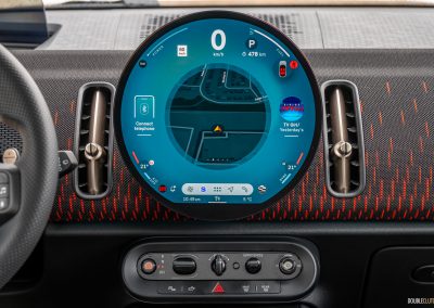Close-up showing the infotainment display and centre stack layout in the 2025 Mini Countryman JCW