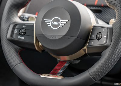 Close-up showing the steering wheel controls and trim in the 2025 Mini Countryman JCW