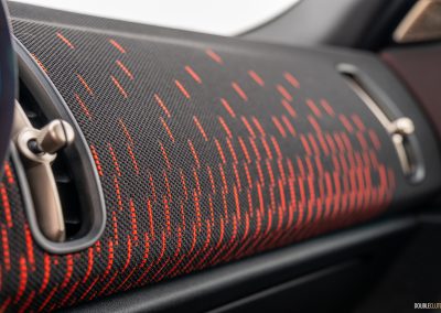 Close-up showing the fabric trim and gold accents in the 2025 Mini Countryman JCW