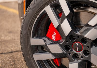 Close-up showing the front wheel and brakes on the 2025 Mini Countryman JCW