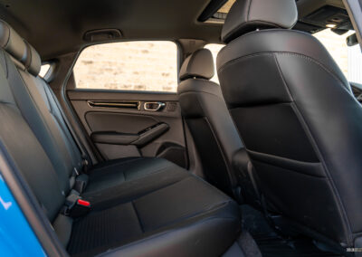 Interior view showing the rear seat area of the 2025 Honda Civic Hybrid Hatchback
