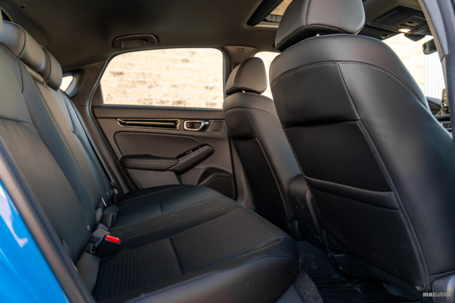 Interior view showing the rear seat area of the 2025 Honda Civic Hybrid Hatchback