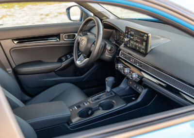 Interior view showing the cockpit area of the 2025 Honda Civic Hybrid Hatchback