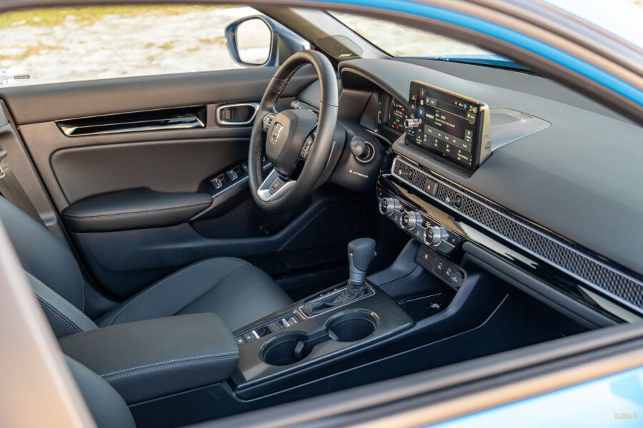 Interior view showing the cockpit area of the 2025 Honda Civic Hybrid Hatchback