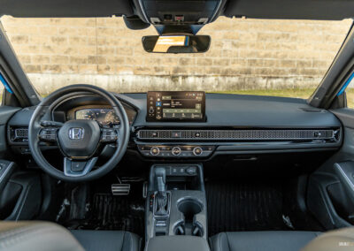 Interior view showing the dashboard design and interior layout of the 2025 Honda Civic Hybrid Hatchback