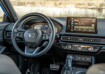 Interior view showing the cockpit area of the 2025 Honda Civic Hybrid Hatchback