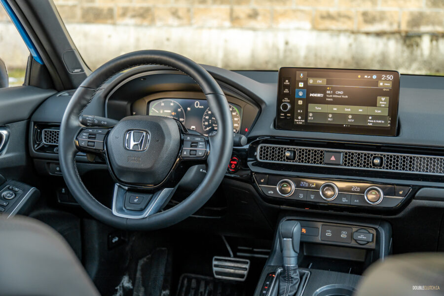 Interior view showing the cockpit area of the 2025 Honda Civic Hybrid Hatchback