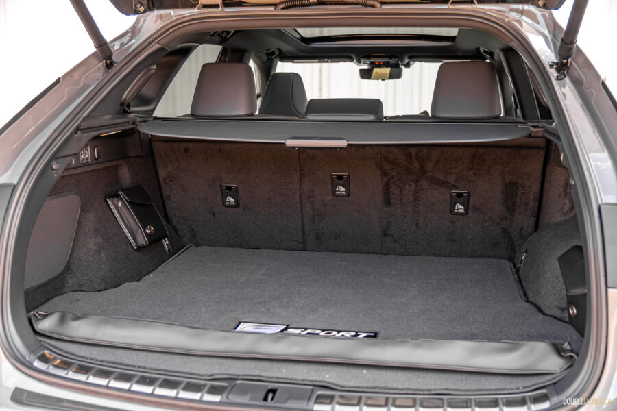 Interior view of the cargo area in a 2025 Lexus RX 500h Black Line Special Edition with the rear seats up