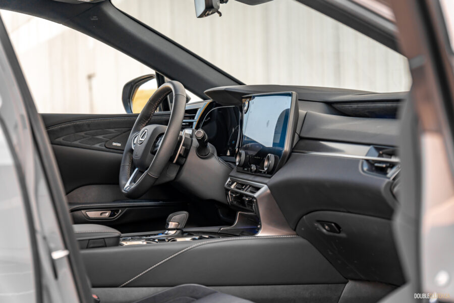 Interior view of the dashboard design and layout in a 2025 Lexus RX 500h Black Line Special Edition