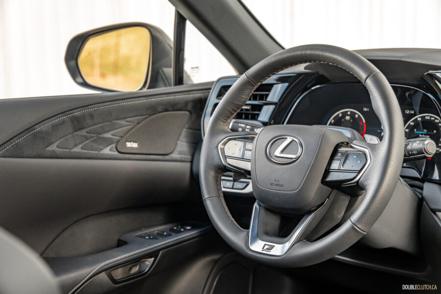 Interior cockpit view of a 2025 Lexus RX 500h Black Line Special Edition