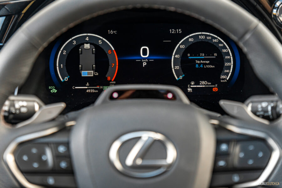 Close-up view showing the steering wheel and digital gauge cluster in a 2025 Lexus RX 500h Black Line Special Edition
