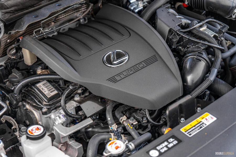 Under-hood view of the turbocharged four-cylinder engine in a 2025 Lexus RX 500h Black Line Special Edition