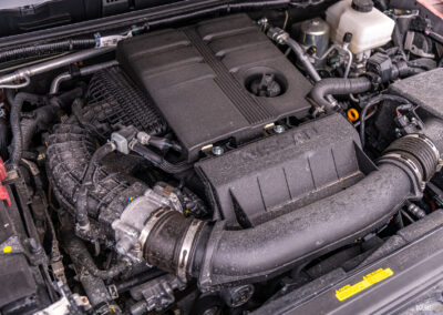 Under-hood view showing the V6 engine in a 2025 Nissan Frontier PRO-4X Luxury