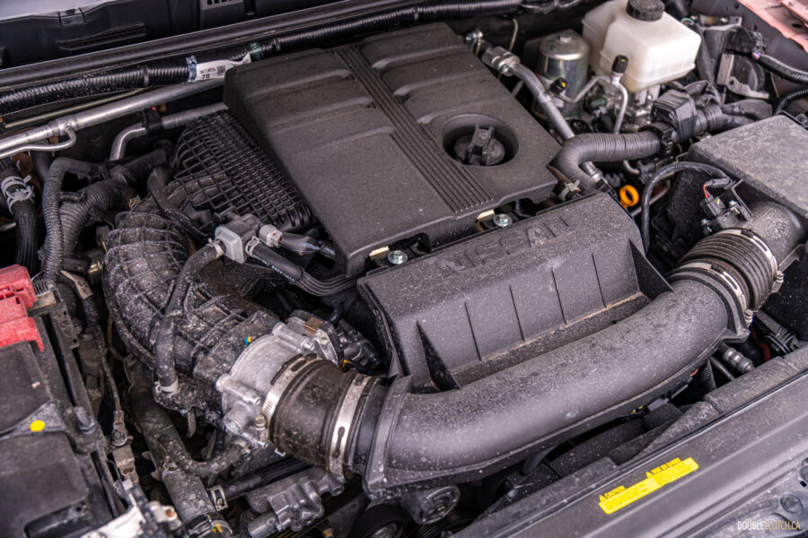 Under-hood view showing the V6 engine in a 2025 Nissan Frontier PRO-4X Luxury