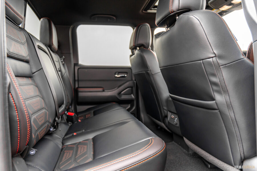 Interior view showing the rear seats in a 2025 Nissan Frontier PRO-4X Luxury
