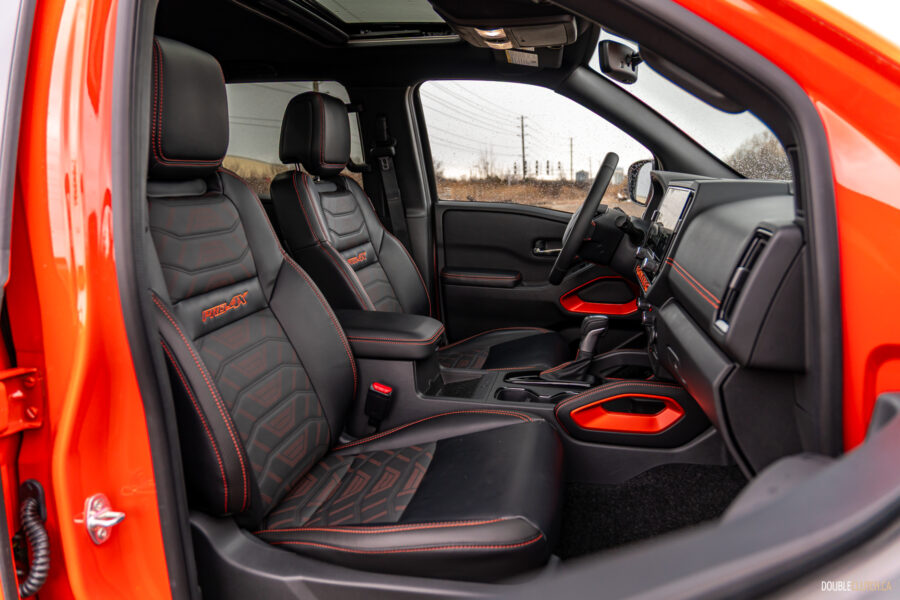 Interior view showing the front seats in a 2025 Nissan Frontier PRO-4X Luxury