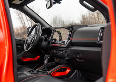 Interior view showing the dashboard design and layout in a 2025 Nissan Frontier PRO-4X Luxury