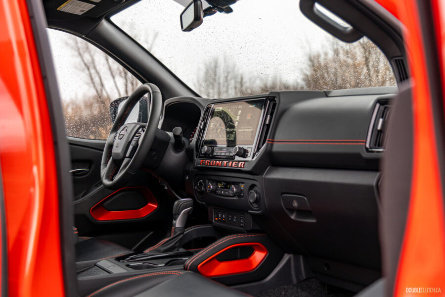 Interior view showing the dashboard design and layout in a 2025 Nissan Frontier PRO-4X Luxury
