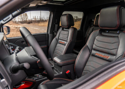 Interior view showing the front seats in a 2025 Nissan Frontier PRO-4X Luxury