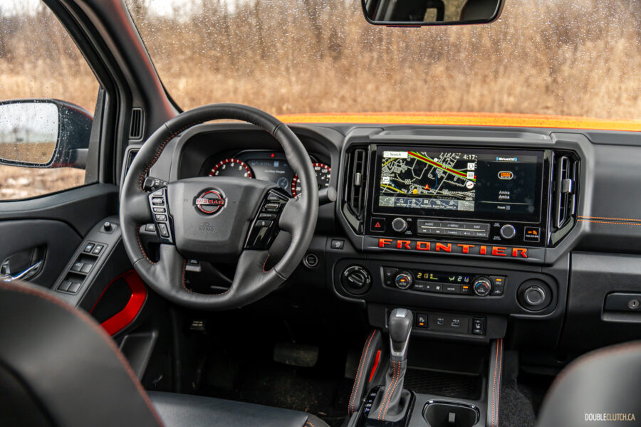 Interior view showing the driver-side cockpit in a 2025 Nissan Frontier PRO-4X Luxury