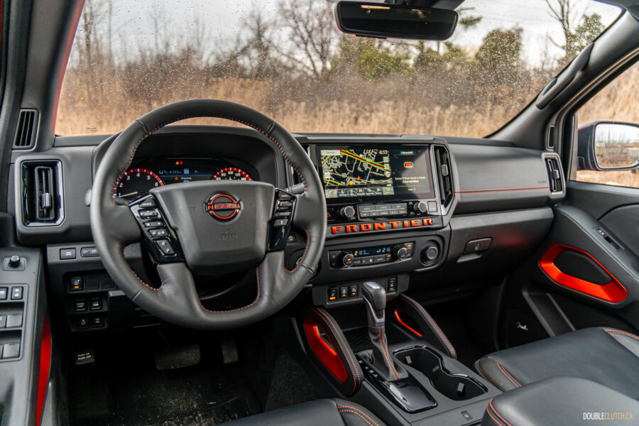 Interior view showing the driver-side cockpit in a 2025 Nissan Frontier PRO-4X Luxury