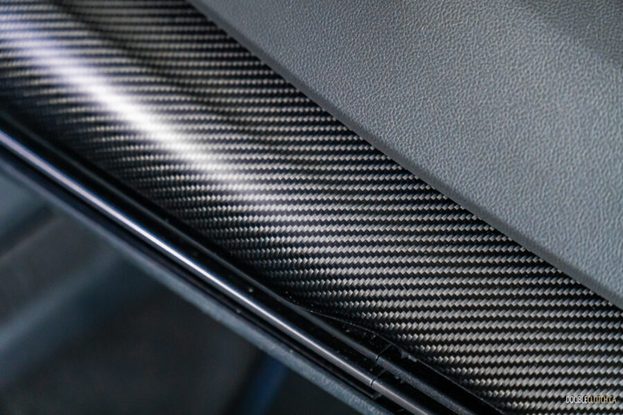 2025 Volkswagen Golf R carbon fibre trim interior close-up view