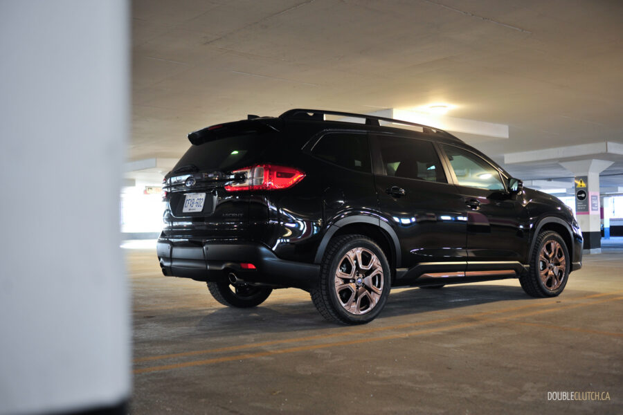 Rear quarter view of a black 2025 Subaru Ascent parked in a parking garage