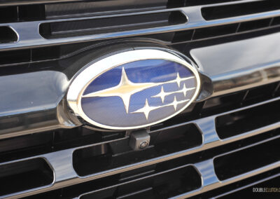 Close-up of the Subaru logo on the front grille of a 2025 Subaru Ascent