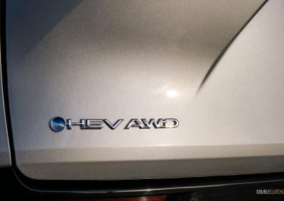 Close-up of the hybrid badge on the back of a 2025 Toyota Sienna