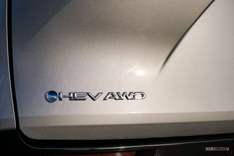 Close-up of the hybrid badge on the back of a 2025 Toyota Sienna