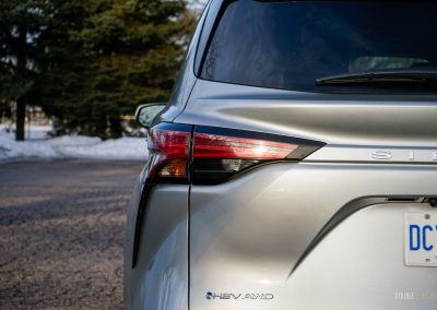 Close-up rear view showing the tail light and badge on a 2025 Toyota Sienna