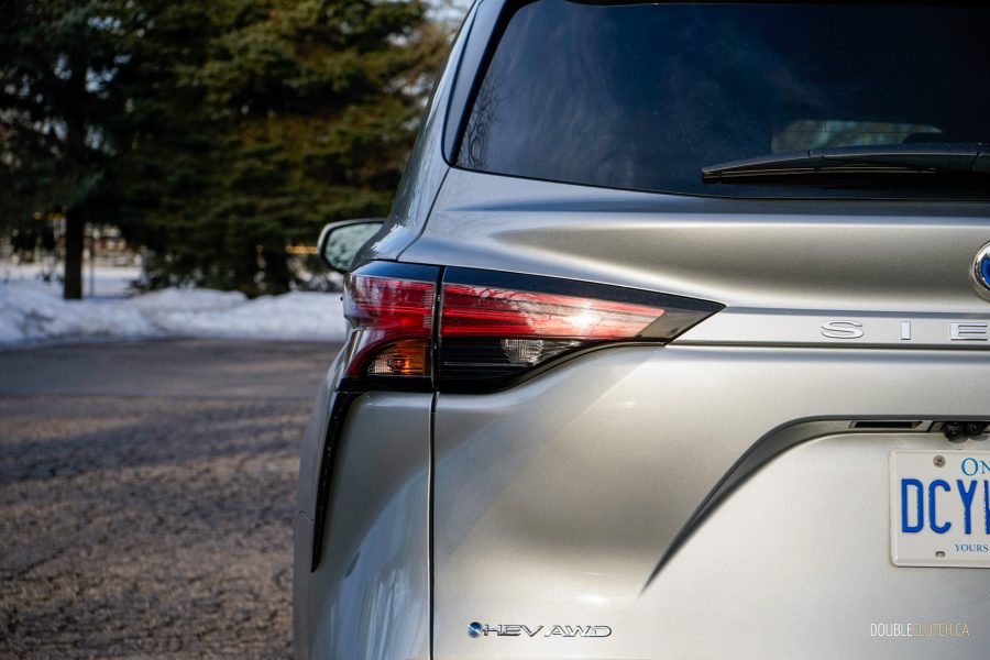 Close-up rear view showing the tail light and badge on a 2025 Toyota Sienna