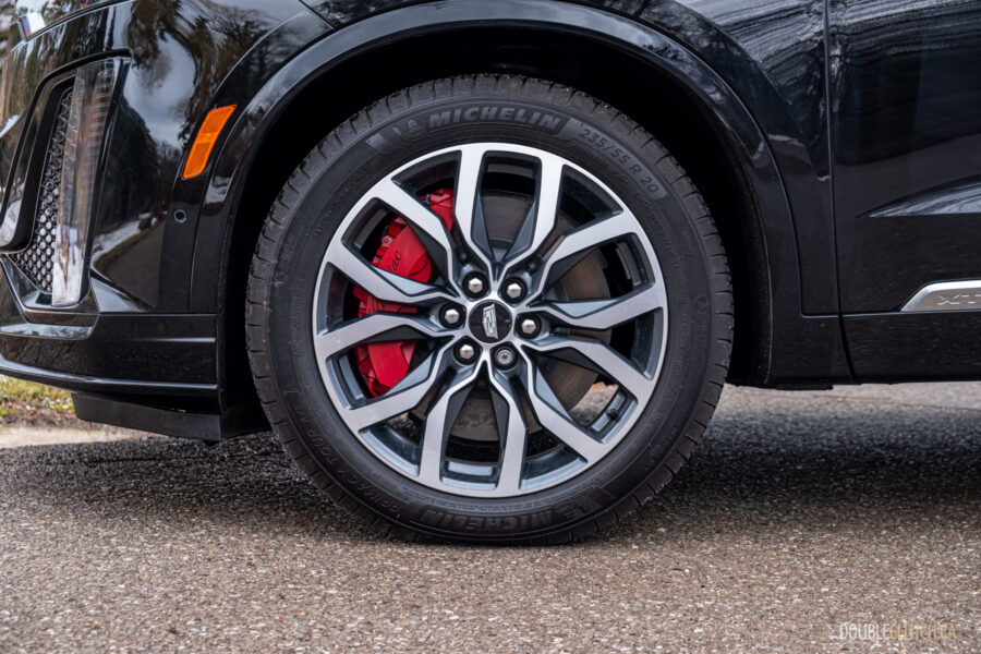 Close-up of the front wheel and red brake caliper on a 2025 Cadillac XT6