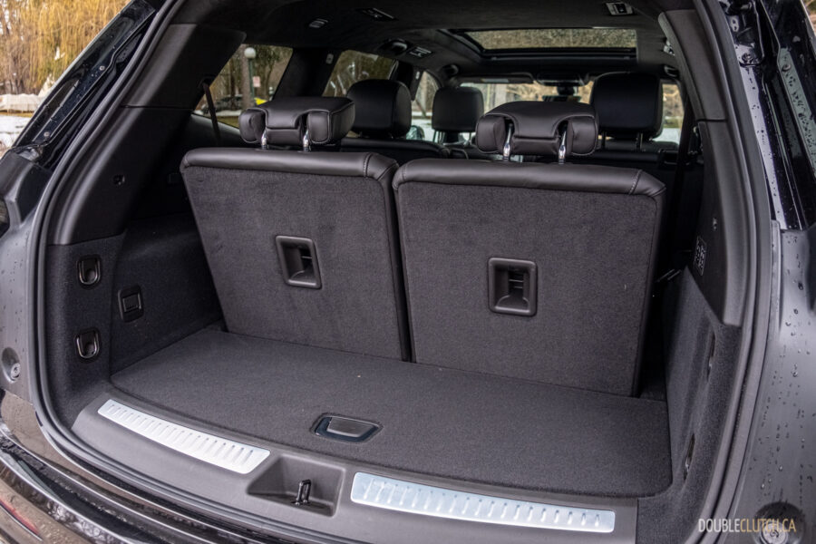 Interior view of the cargo area in a 2025 Cadillac XT6 with the third row up