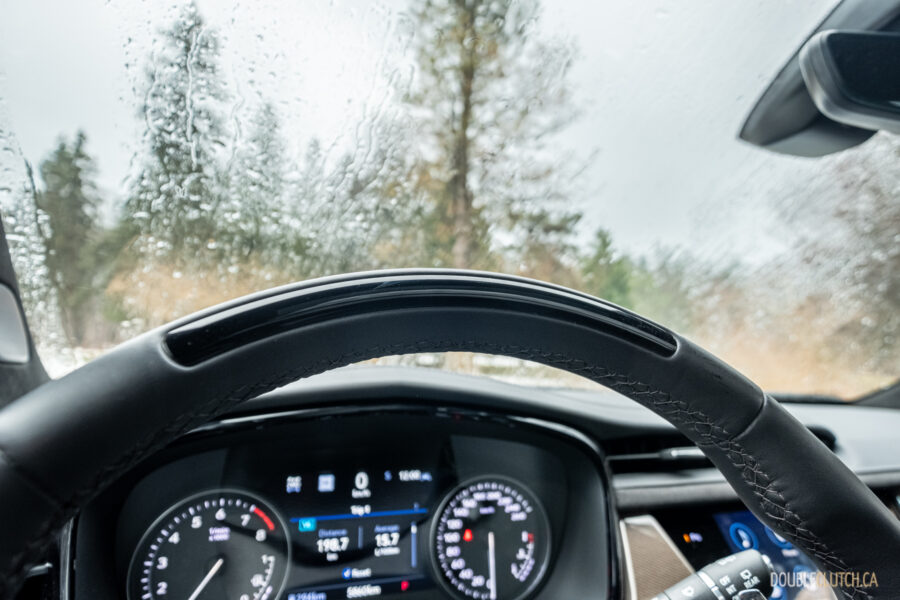 Close-up of the Super Cruise indicator on the steering wheel of the 2025 Cadillac XT6