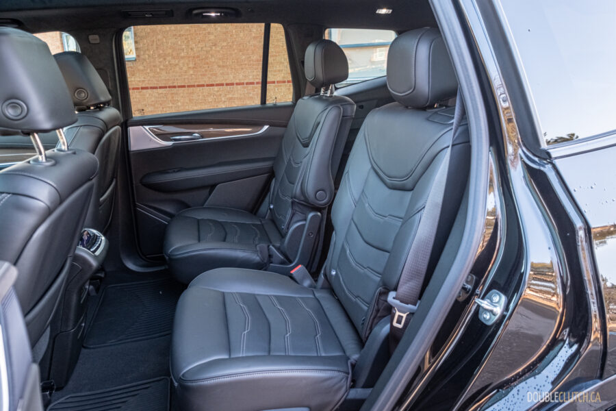 Interior view of the second-row captain's chairs in a 2025 Cadillac XT6