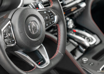 2025 Acura MDX A-Spec driver-side cockpit close-up