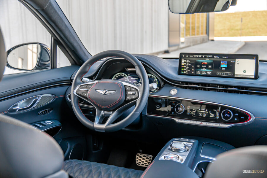 Interior view showing the driver cockpit area in a 2025 Genesis GV70 3.5T Sport Plus