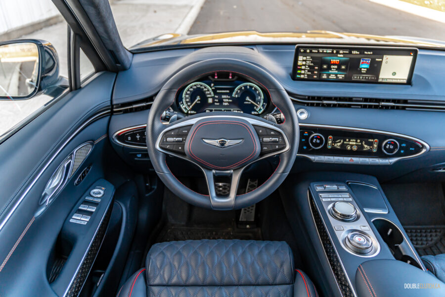 Interior view showing the driver cockpit area in a 2025 Genesis GV70 3.5T Sport Plus