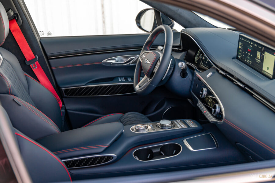 Interior view showing the driver cockpit area in a 2025 Genesis GV70 3.5T Sport Plus