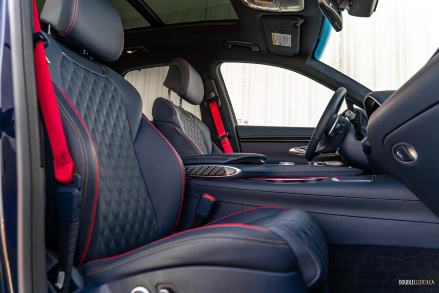 Interior view showing the front-seat area in a 2025 Genesis GV70 3.5T Sport Plus