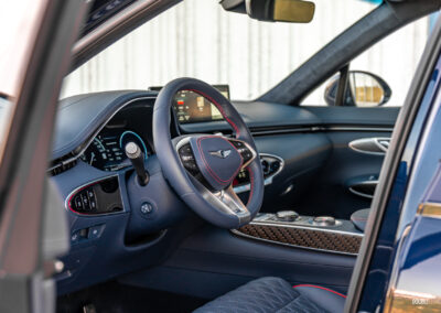 Interior view showing the driver cockpit area in a 2025 Genesis GV70 3.5T Sport Plus