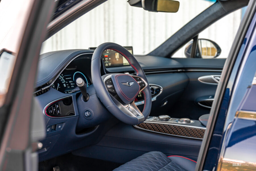 Interior view showing the driver cockpit area in a 2025 Genesis GV70 3.5T Sport Plus