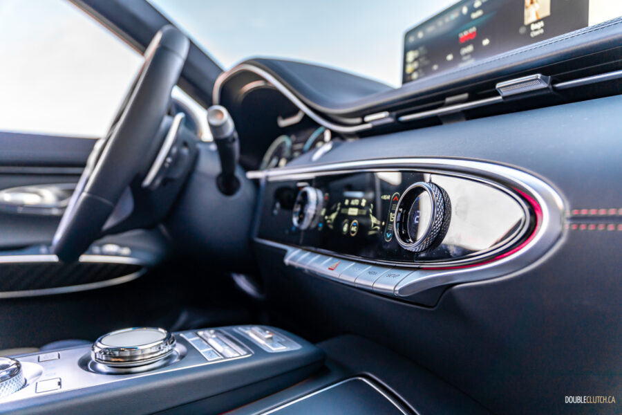 Close-up view showing the climate controls in a 2025 Genesis GV70 3.5T Sport Plus